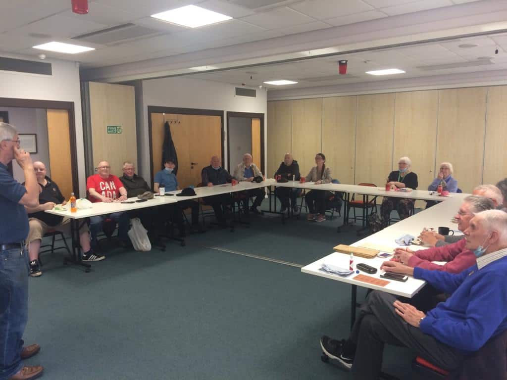 Group of people attending a meeting about the BSL (Scotland) Act 2015.