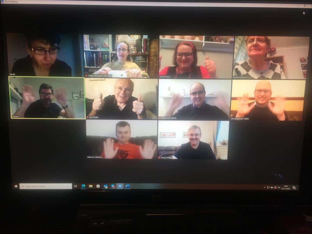 Zoom call with diverse participants discussing BSL (Scotland) Act 2015.