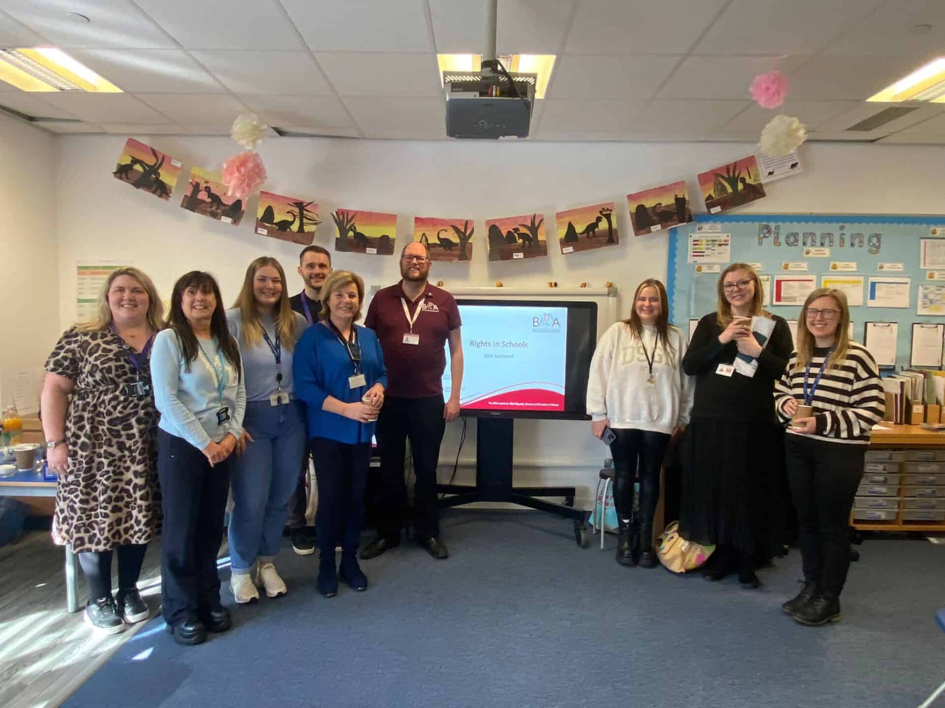 Group of people at BSL Act 2015 awareness event in Scotland.