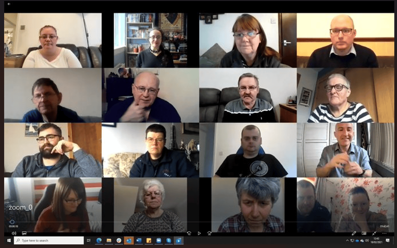 Group of people discussing BSL (Scotland) Act 2015 in a virtual meeting.