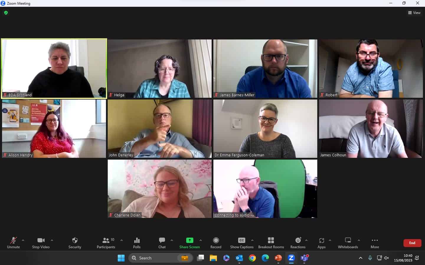 Group of people discussing the BSL (Scotland) Act 2015 in a virtual meeting.