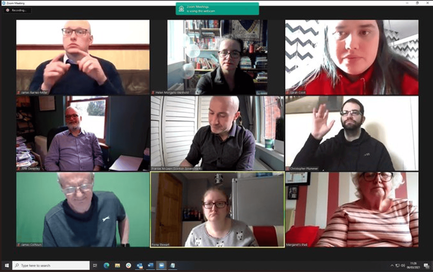 Online meeting discussing the BSL (Scotland) Act 2015 and deaf community rights.
