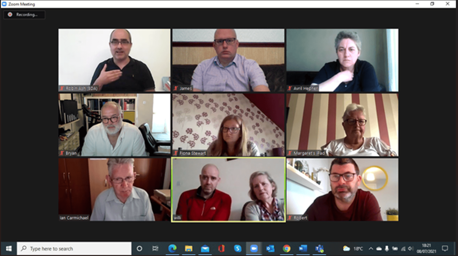 Group of people discussing the BSL (Scotland) Act 2015 in a virtual meeting.
